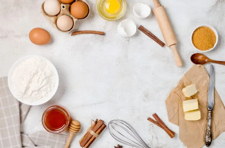 Ingredients for making dough dishes: cakes, cookies, muffins, pies on a gray background.